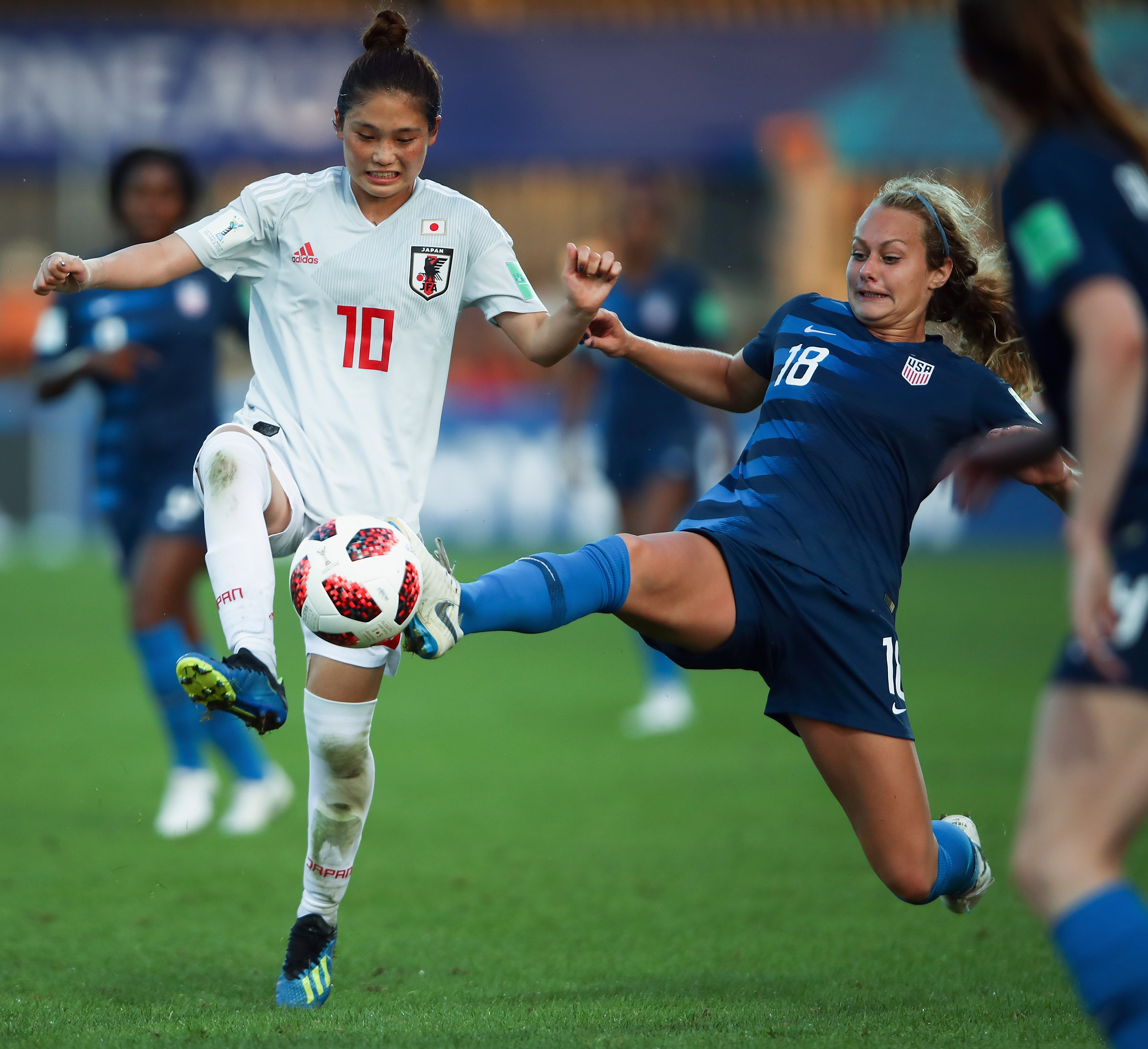 : Fuka Nagano (L) of Japan is challenged by Jaelin Howell of the United States during the FIFA U-20 Women's World Cup France 2018 group C match between USA and Japan at Stade Guy-Piriou on August 6, 2018 in Concarneau, France. 